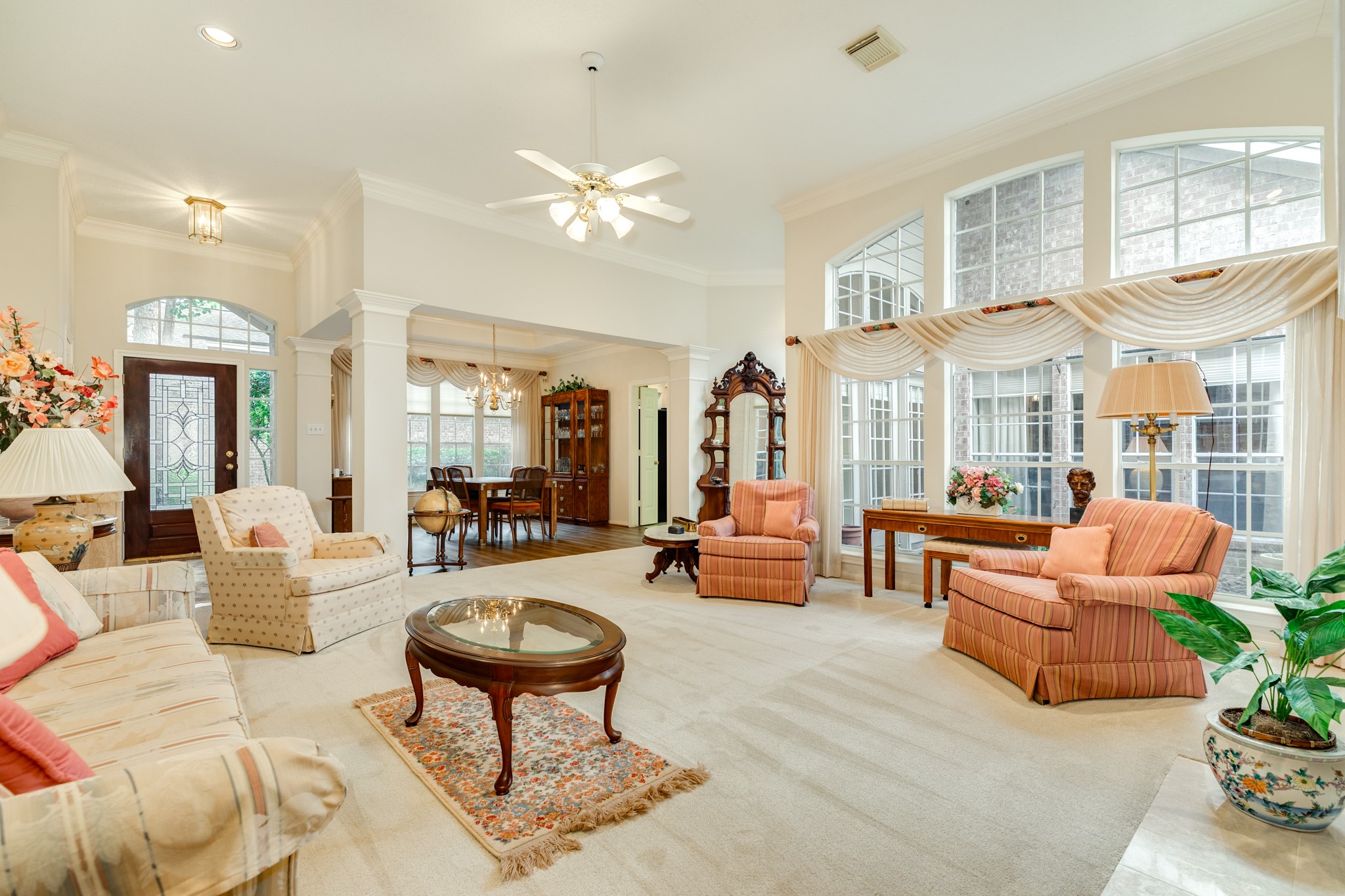 16522 Shadow Path Drive Pasadena, TX 77059 - Photo 7 of 33 a living room with furniture a rug and a chandelier
