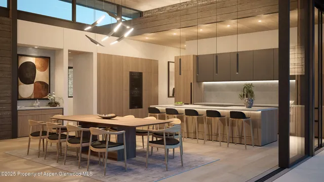 a kitchen with a table and chairs