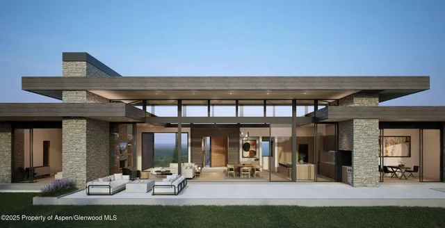 a view of a chair and tables in patio of the house