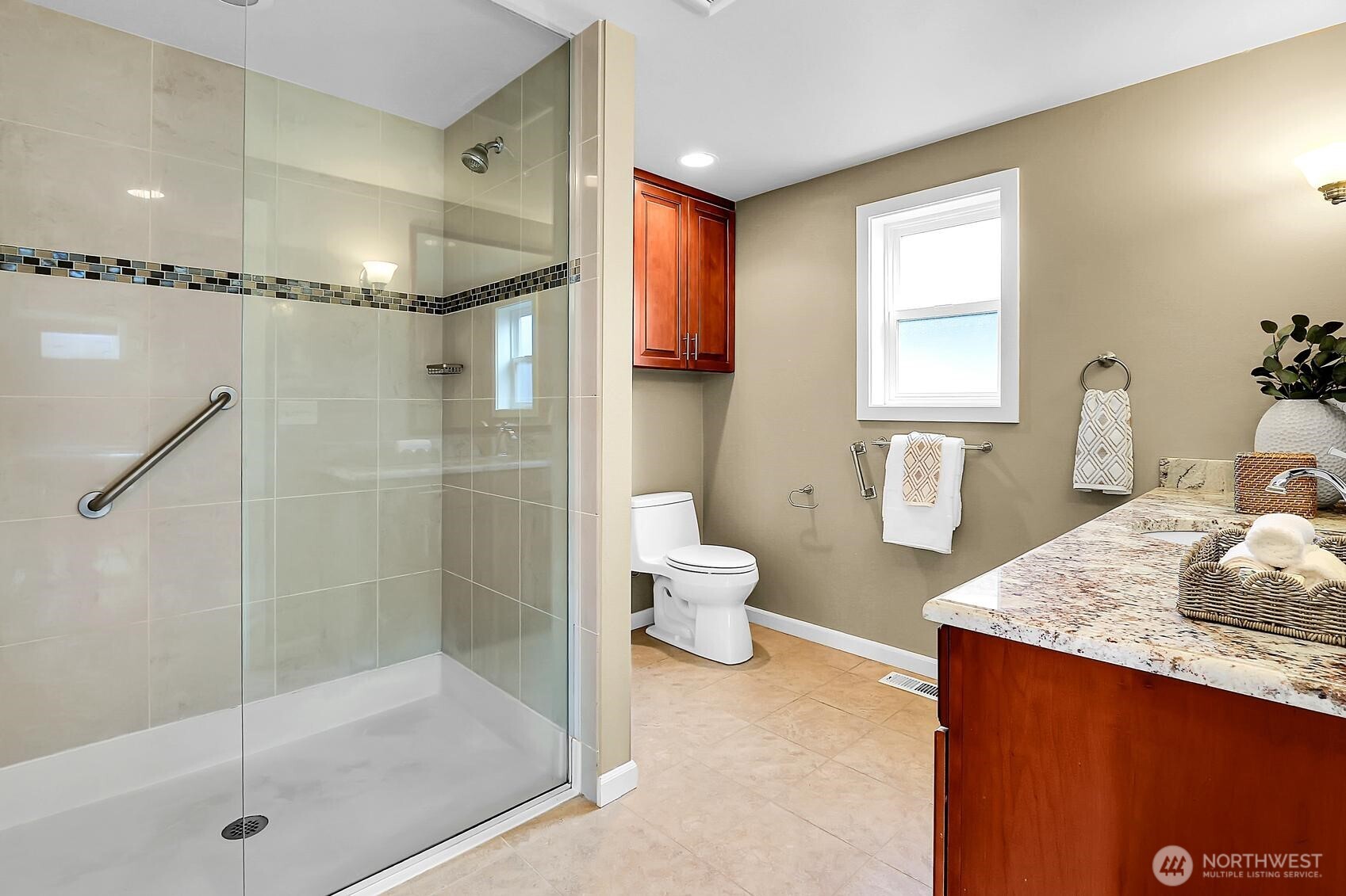 624 Alder Street Edmonds, WA 98020 - Photo 14 of 23 a bathroom with a granite countertop sink a toilet and shower