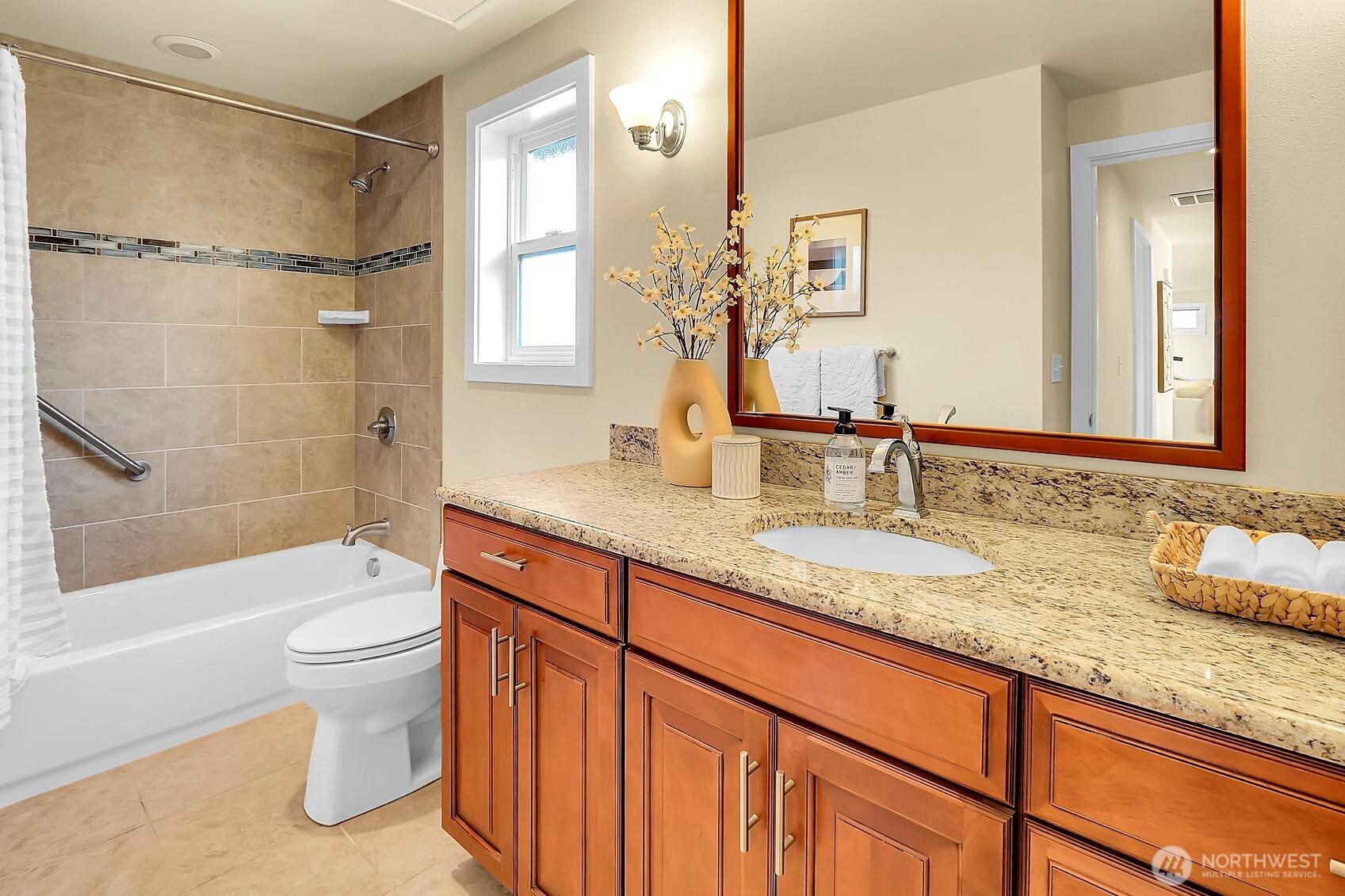 624 Alder Street Edmonds, WA 98020 - Photo 16 of 23 a bathroom with a granite countertop sink toilet and shower