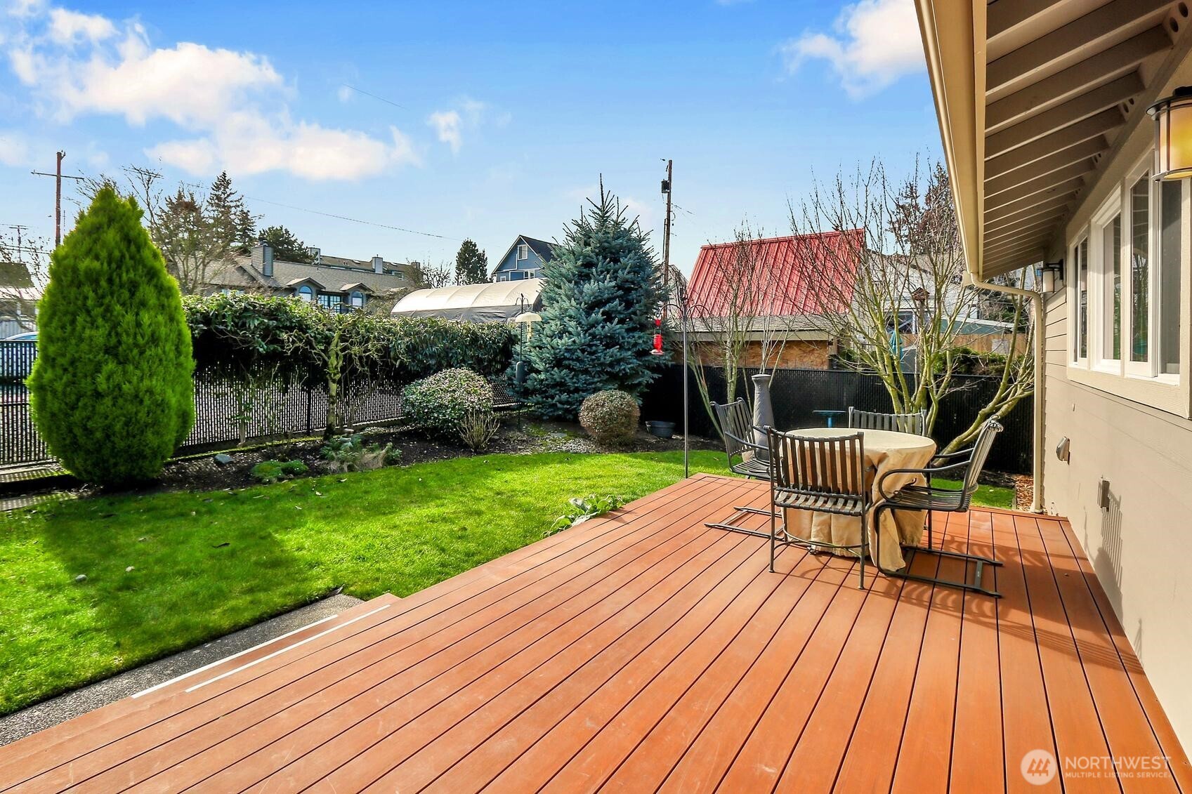 624 Alder Street Edmonds, WA 98020 - Photo 18 of 23 a view of a backyard with sitting area