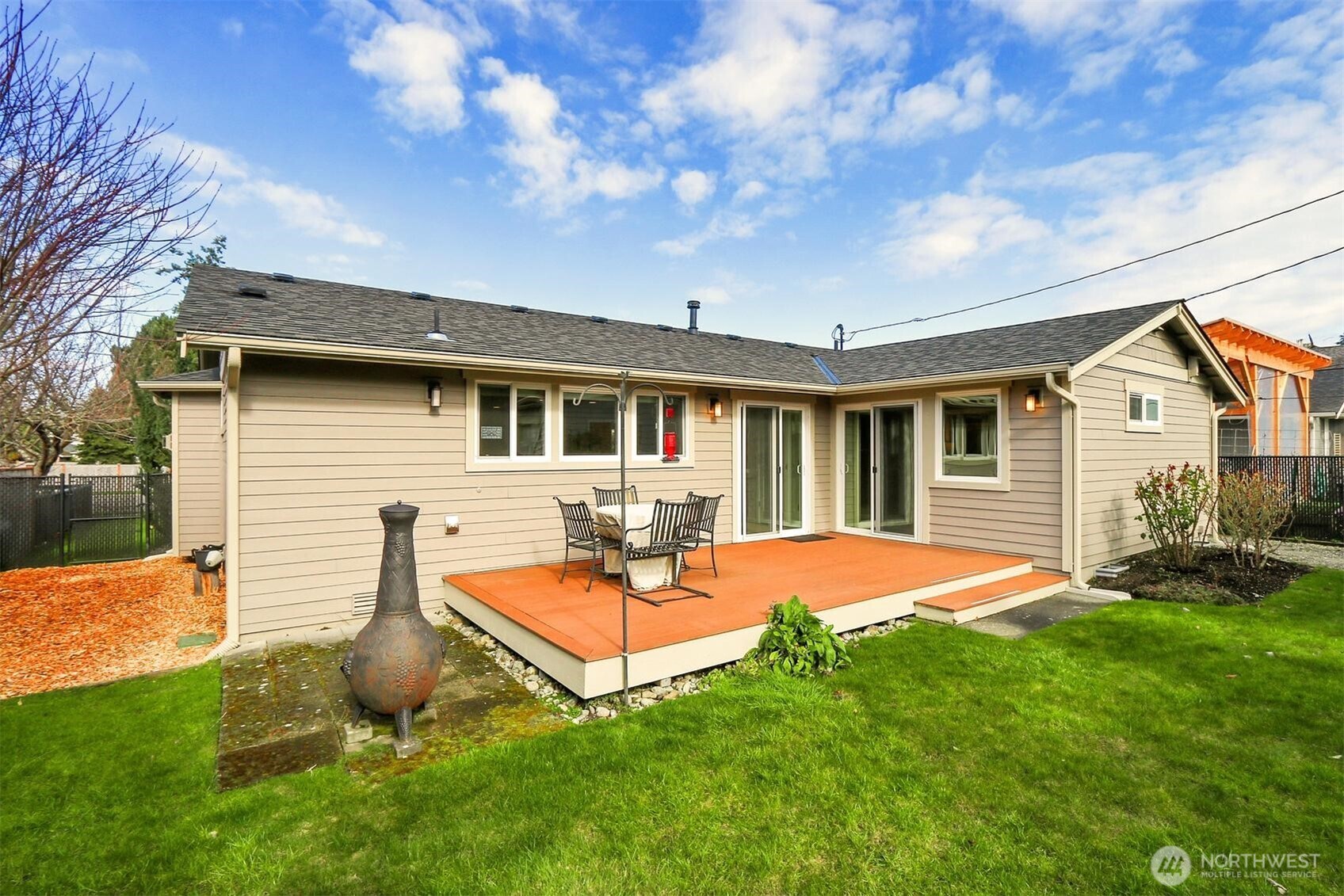 624 Alder Street Edmonds, WA 98020 - Photo 19 of 23 a view of a house with backyard and sitting area