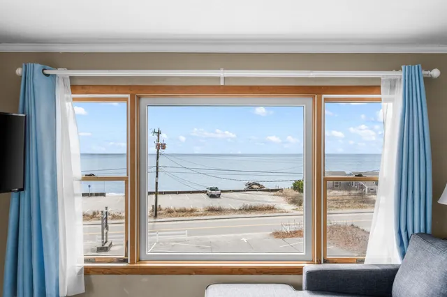 a view of a living room and a window
