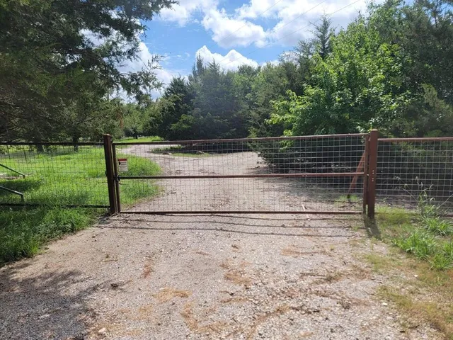 a view of backyard with green space