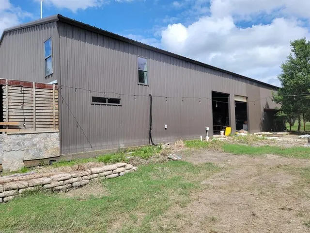 a view of backyard with green space