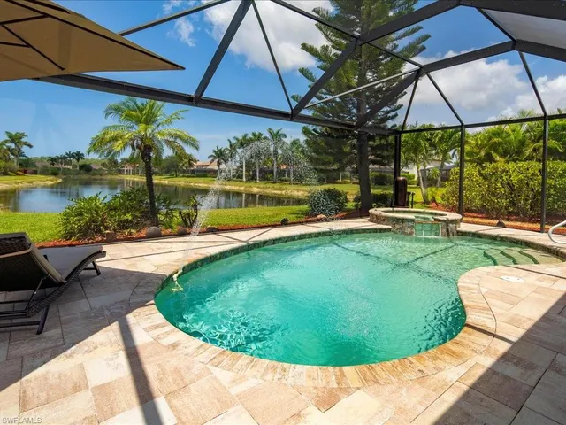 a view of a swimming pool with a garden