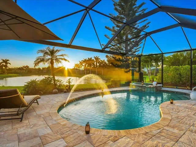 a view of a swimming pool with a patio