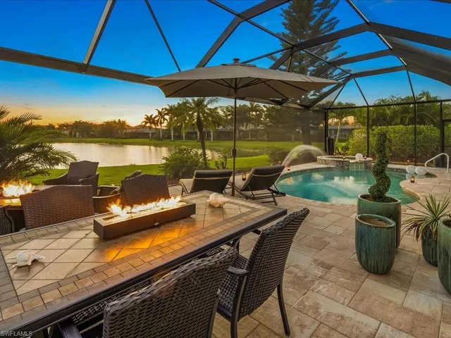 a view of a swimming pool with a patio