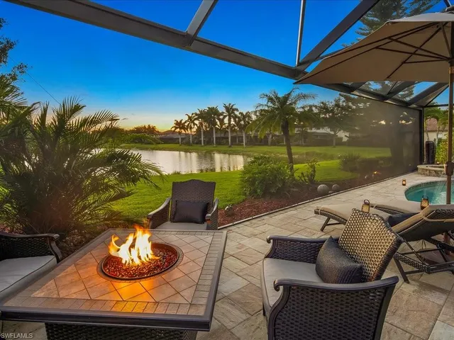 a view of a patio with swimming pool