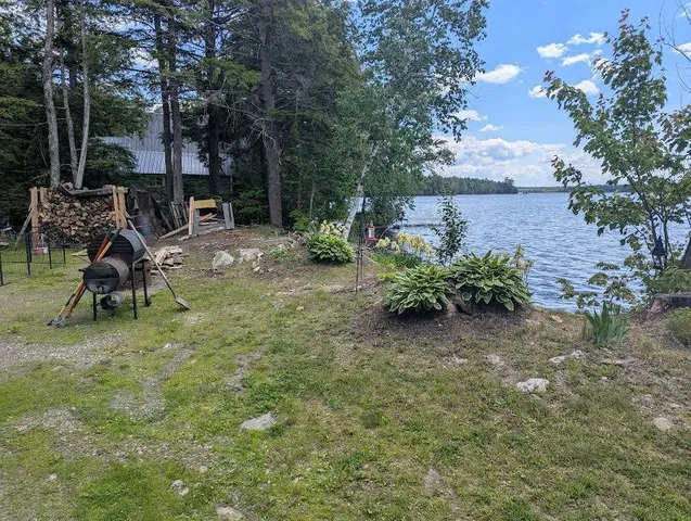 $299,900 | 114 Plunkett Pond Road, Benedicta, ME 04733
