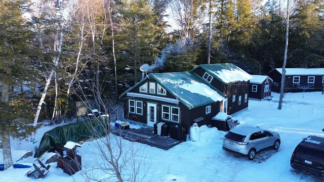 $299,900 | 114 Plunkett Pond Road, Benedicta, ME 04733