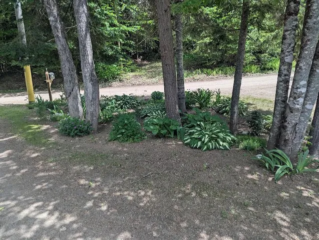 $299,900 | 114 Plunkett Pond Road, Benedicta, ME 04733