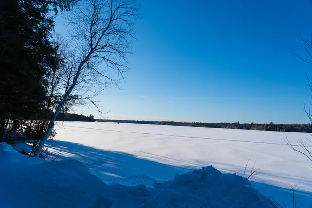 $299,900 | 114 Plunkett Pond Road, Benedicta, ME 04733