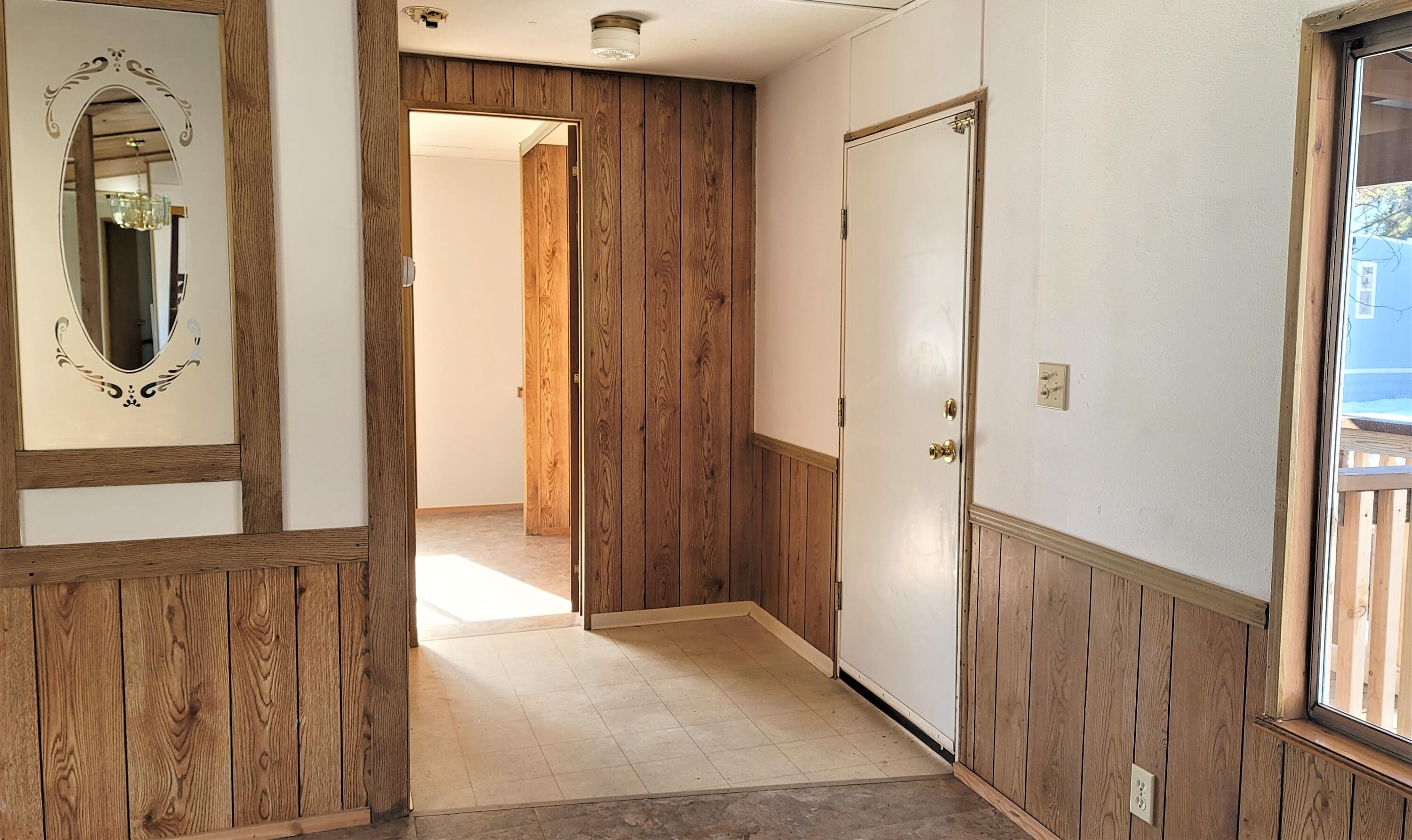 52731 Huntington Road, Unit 22 La Pine, OR 97739 - Photo 16 of 22 Front door and entry into secondary bedroom