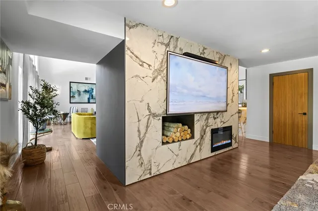 a kitchen with kitchen island a counter top space appliances and cabinets
