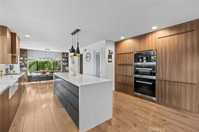 a spacious bathroom with a bathtub and a sink