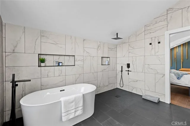 a bathroom with a sink mirror and vanity