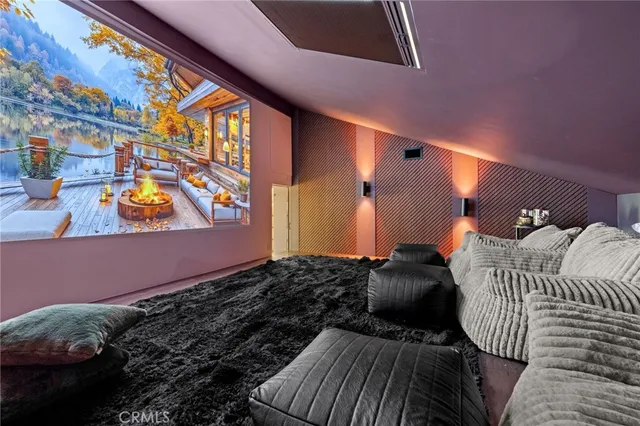 an aerial view of a house with a garden and trees