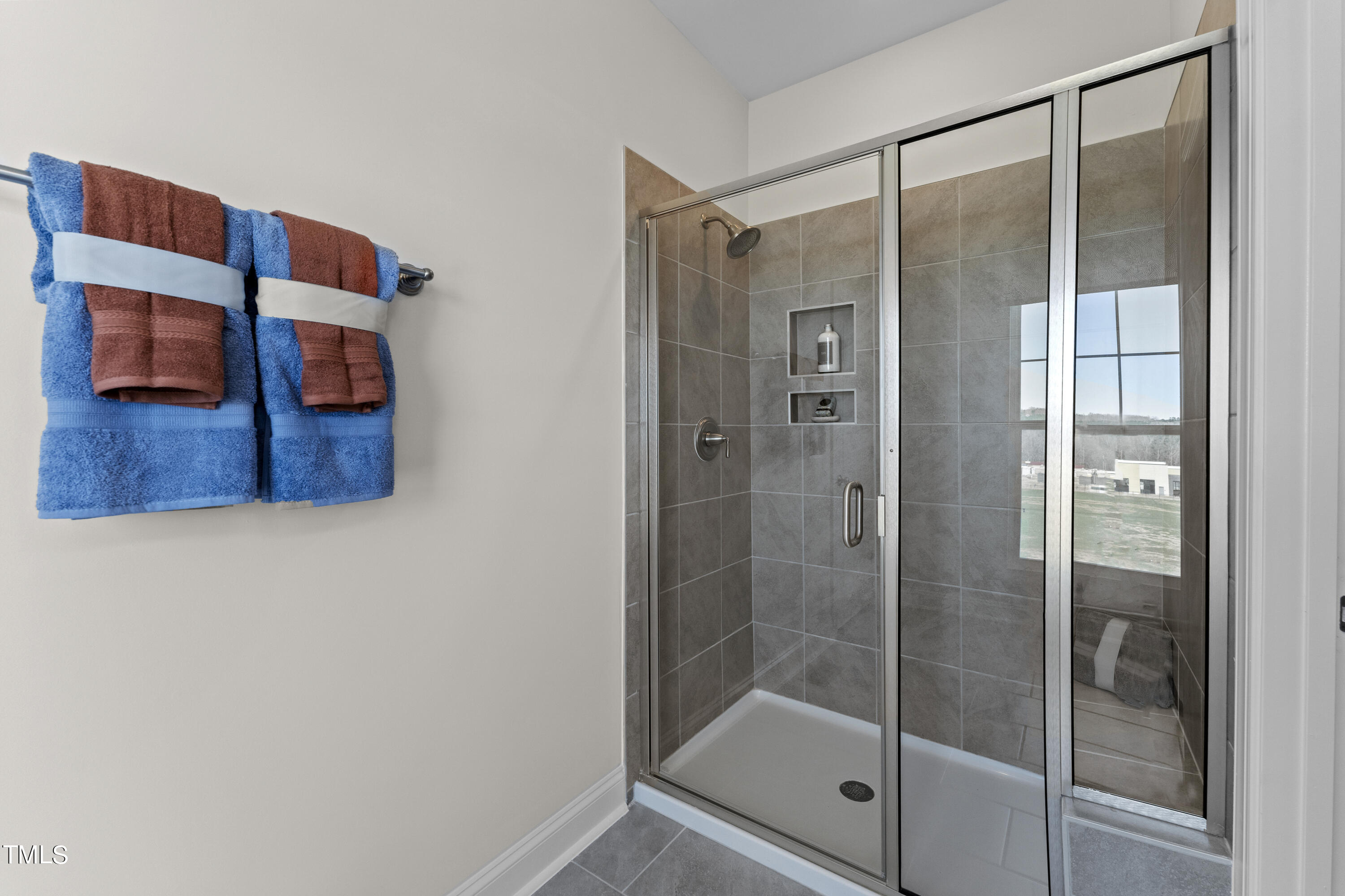 512 Hedrick Ridge Road Cary, NC 27519 - Photo 13 of 19 a bathroom with a shower and a sink