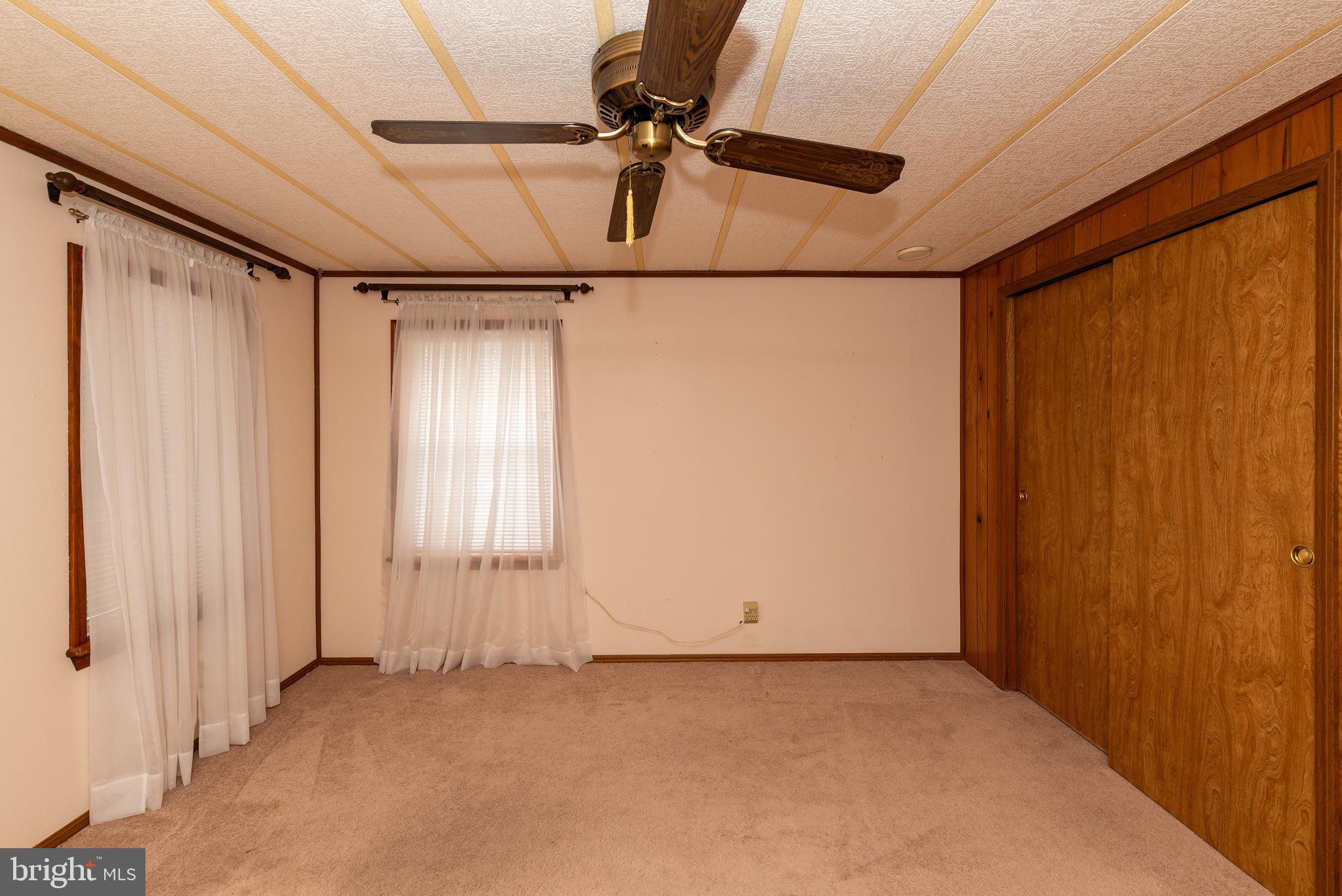 453 Priscilla Lane Buena, NJ 08310 - Photo 22 of 52 an empty room with windows