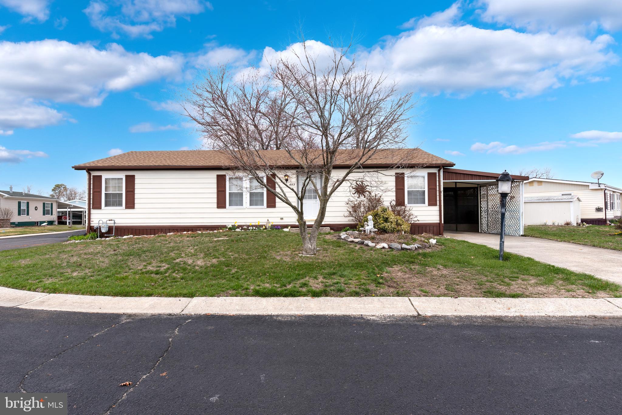 453 Priscilla Lane Buena, NJ 08310 - Photo 3 of 52 a front view of a house with a yard and garage