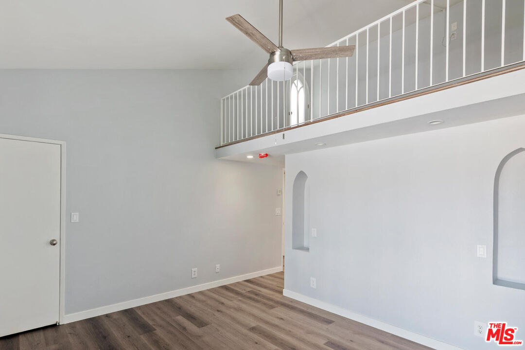 29239 Heathercliff Road, Unit 12 Malibu, CA 90265 - Photo 20 of 32 a view of an entryway with wooden floor