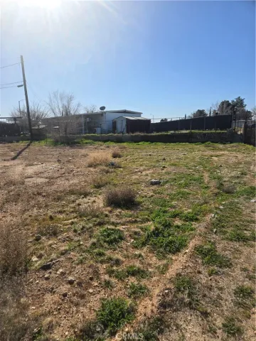 a view of a lake with houses in the back