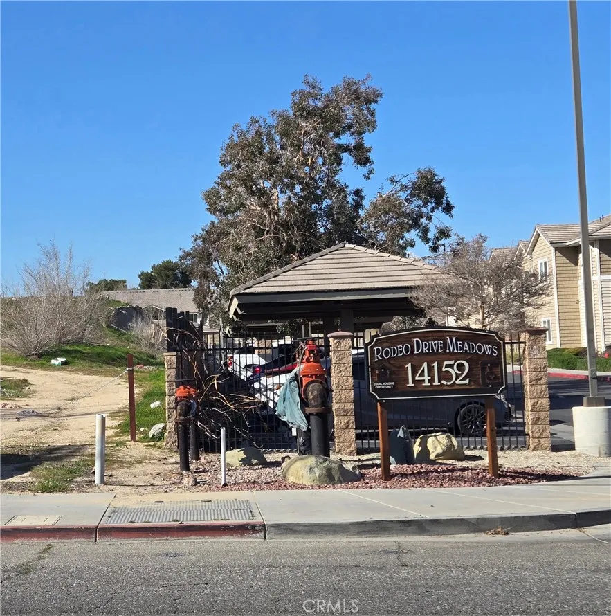 14140 Rodeo Drive Victorville, CA 92395 - Photo 9 of 11 a view of a street with sitting area