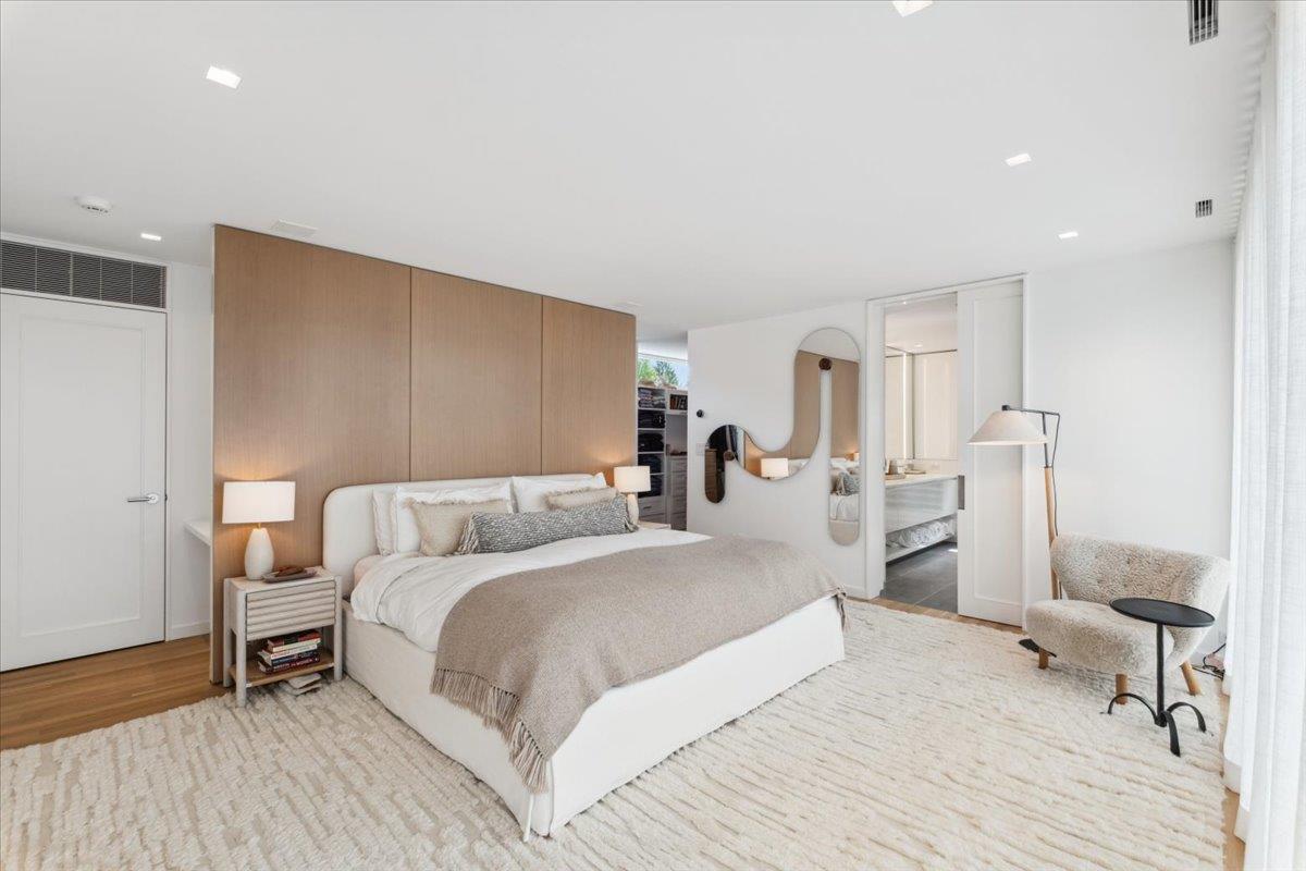 35 Halsted Place Rye, NY 10580 - Photo 17 of 41 a bedroom with a bed and a table