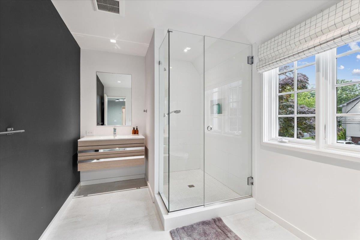 35 Halsted Place Rye, NY 10580 - Photo 22 of 41 a bathroom with a shower and a tub