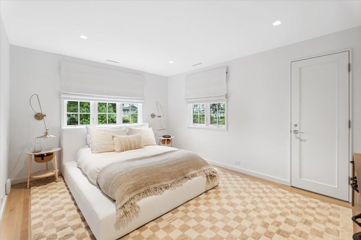 35 Halsted Place Rye, NY 10580 - Photo 23 of 41 a bedroom with a large bed and a window