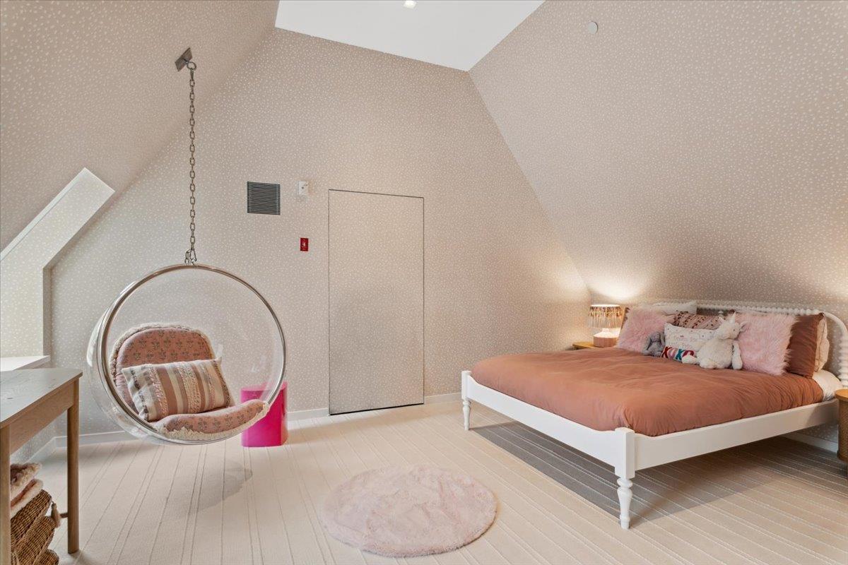 35 Halsted Place Rye, NY 10580 - Photo 25 of 41 a bedroom with a bed and a large window