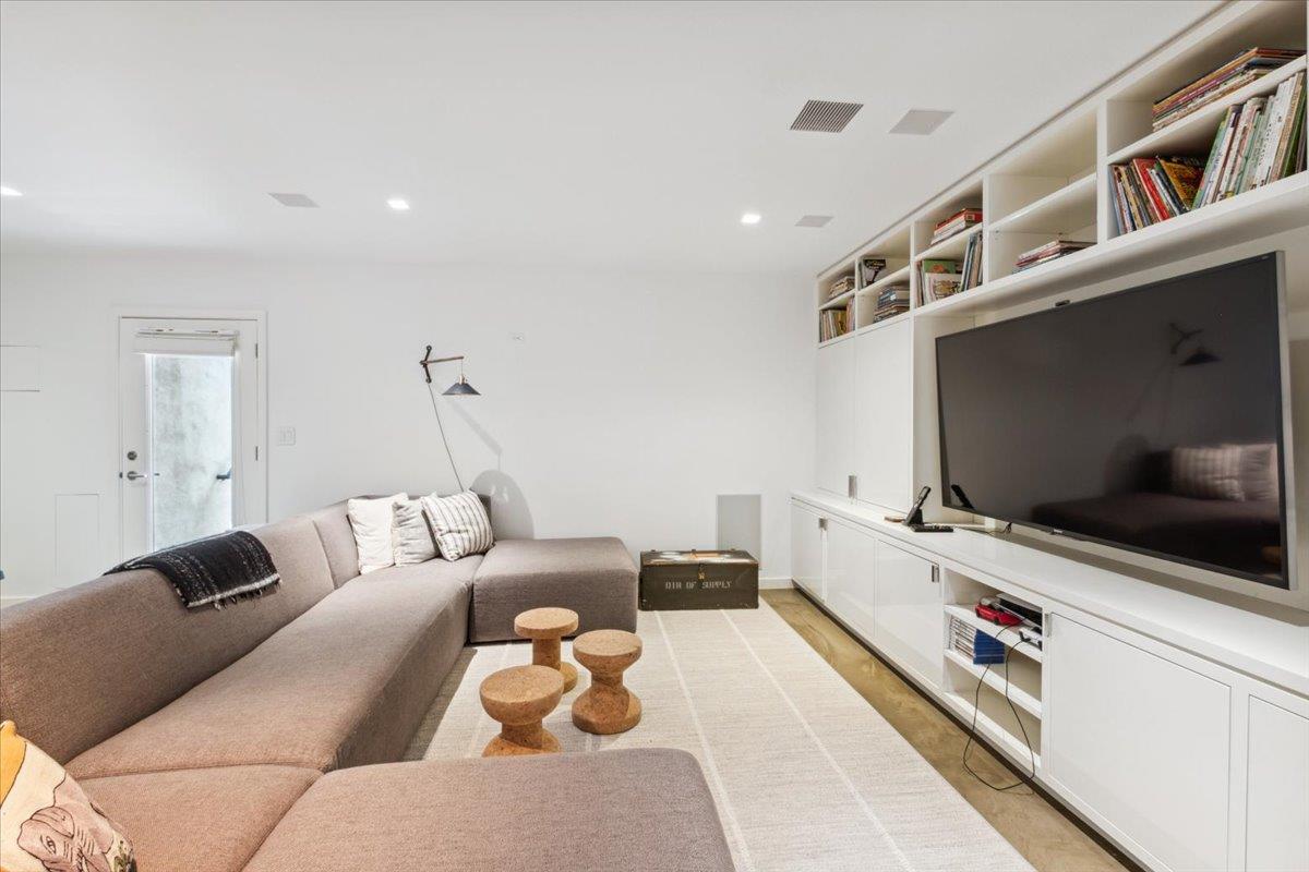 35 Halsted Place Rye, NY 10580 - Photo 29 of 41 a living room with furniture and a flat screen tv