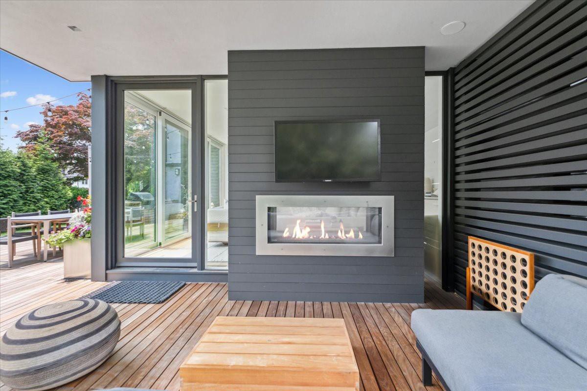 35 Halsted Place Rye, NY 10580 - Photo 32 of 41 a bedroom with a bed and a large window