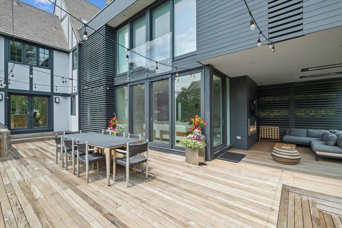35 Halsted Place Rye, NY 10580 - Photo 33 of 41 a table and chairs in front of a house