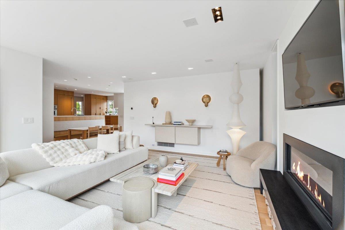 35 Halsted Place Rye, NY 10580 - Photo 5 of 41 a living room with furniture and a flat screen tv
