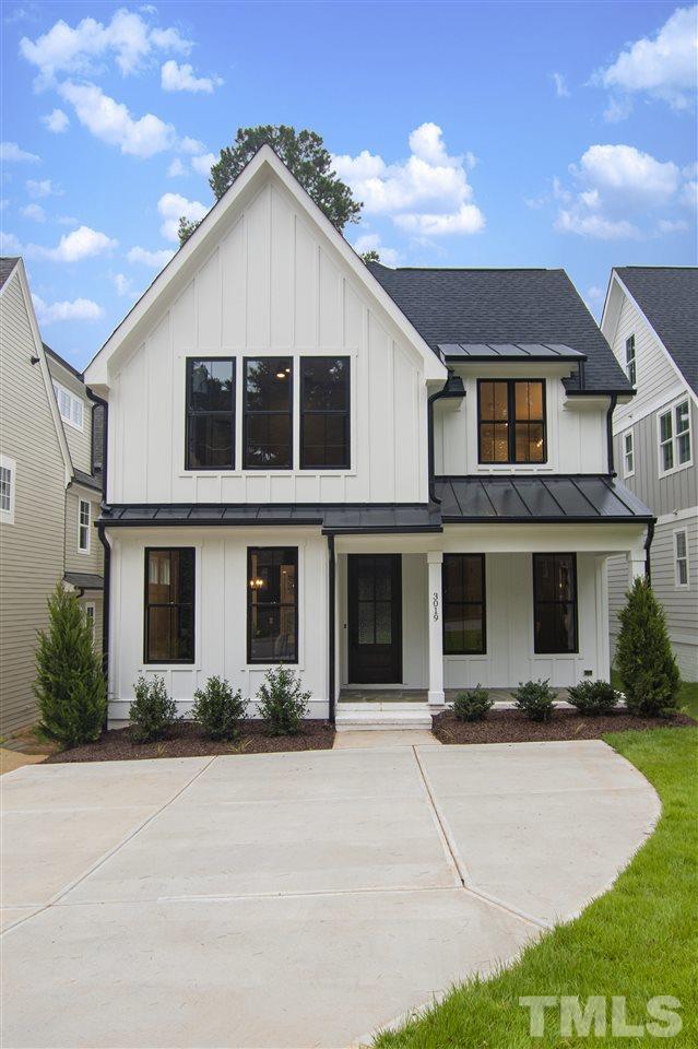 3019 Lewis Farm Road Raleigh, NC 27607 - Photo 1 of 30 a front view of a house with a yard