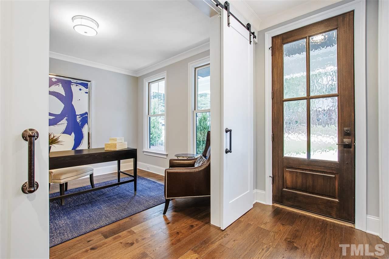 3019 Lewis Farm Road Raleigh, NC 27607 - Photo 2 of 30 a view of a livingroom with furniture and a window