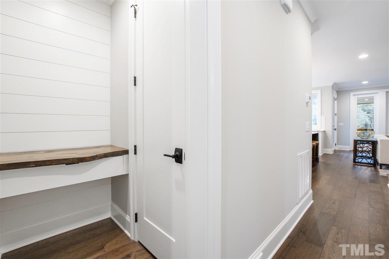 3019 Lewis Farm Road Raleigh, NC 27607 - Photo 16 of 30 a view of walk in closet with wooden floor