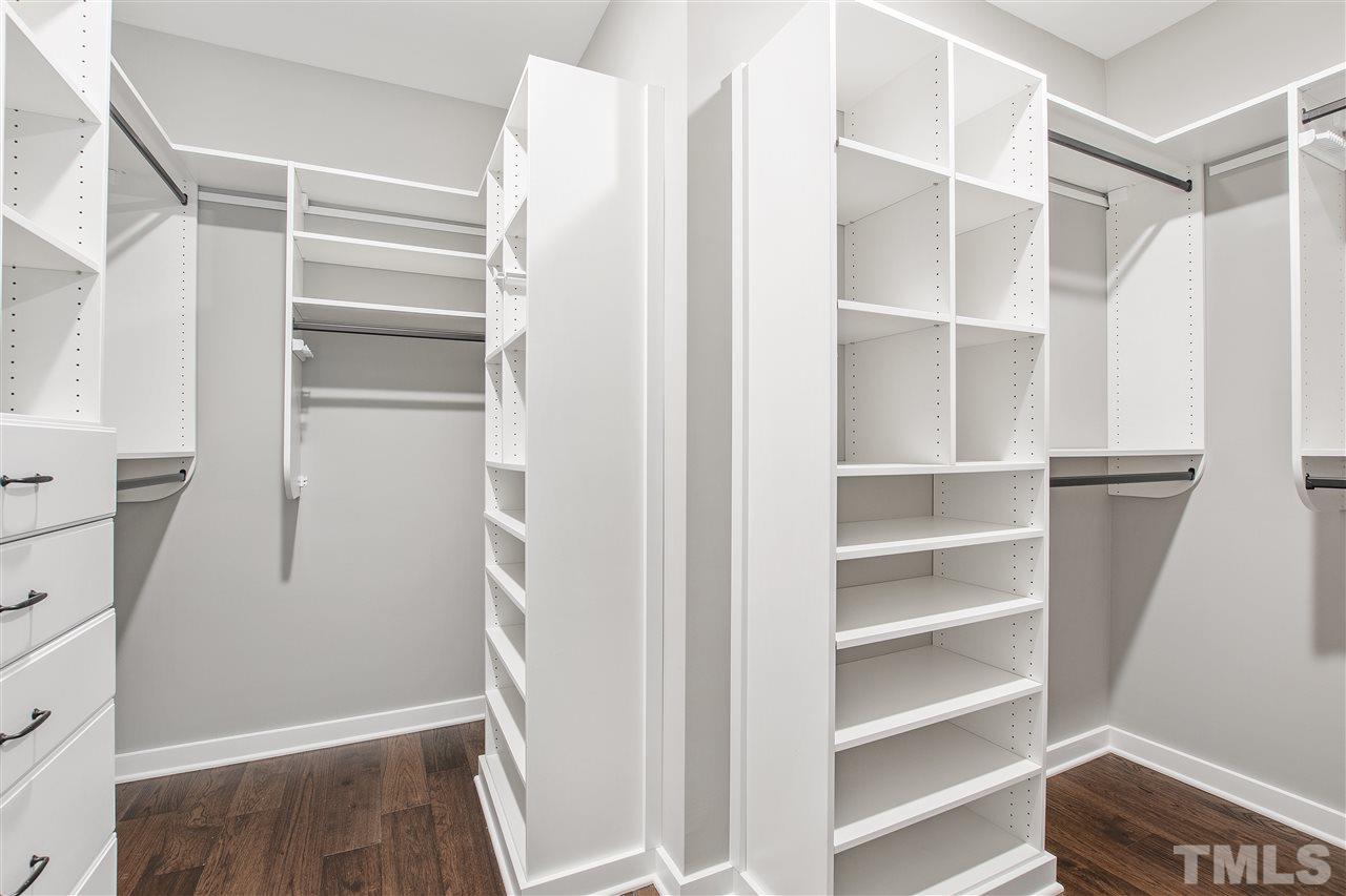 3019 Lewis Farm Road Raleigh, NC 27607 - Photo 22 of 30 a view of walk in closet with empty racks