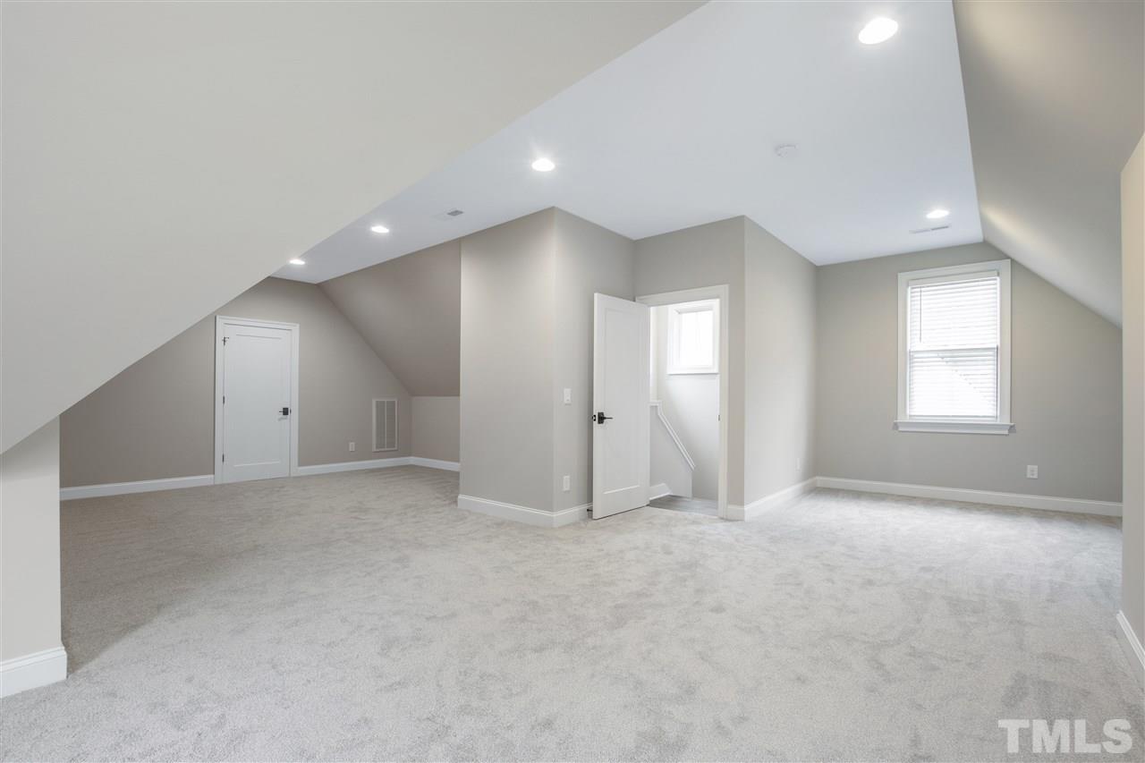 3019 Lewis Farm Road Raleigh, NC 27607 - Photo 23 of 30 an empty room with windows and closet
