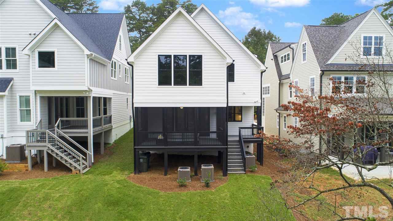 3019 Lewis Farm Road Raleigh, NC 27607 - Photo 25 of 30 a view of house with a yard