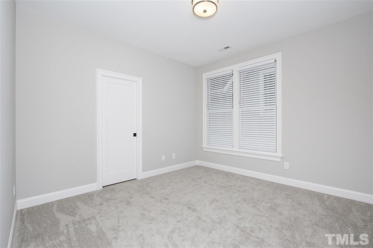3019 Lewis Farm Road Raleigh, NC 27607 - Photo 27 of 30 an empty room with a window