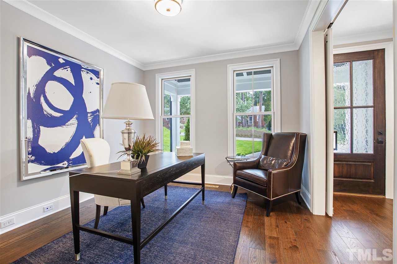 3019 Lewis Farm Road Raleigh, NC 27607 - Photo 4 of 30 a living room with furniture and wooden floor