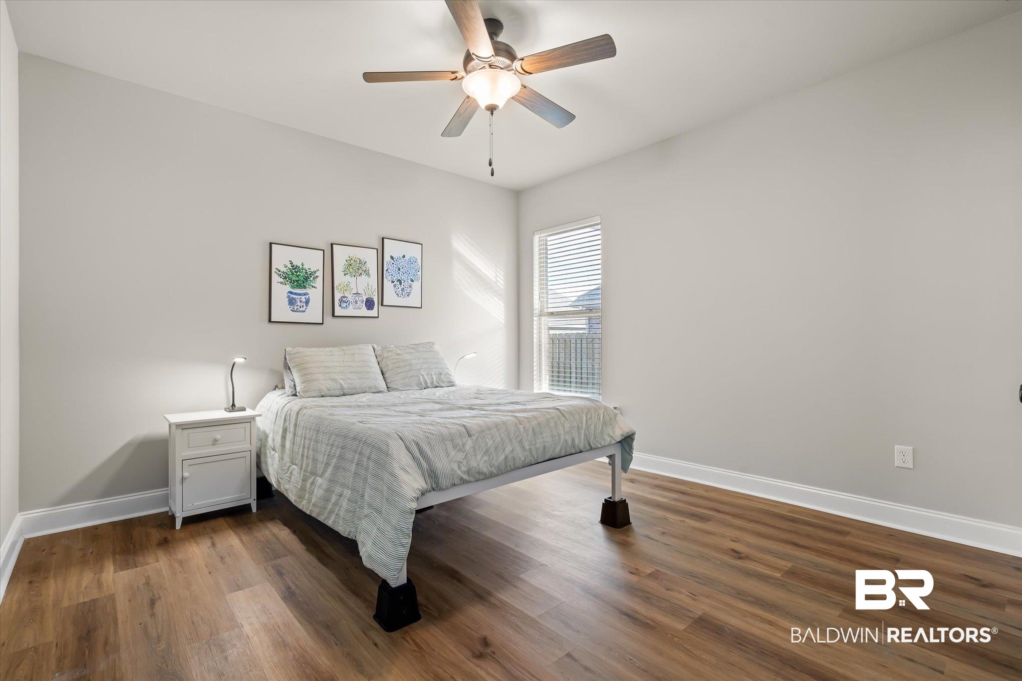 1116 Stella Road Foley, AL 36535 - Photo 16 of 29 Bedroom with dark hardwood / wood-style flooring and ceiling fan