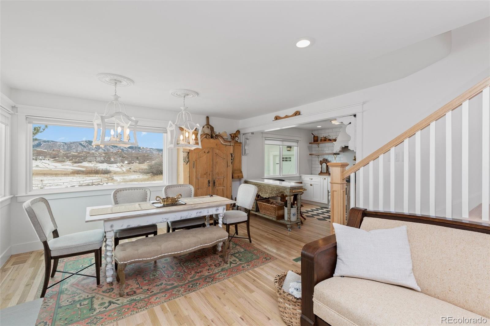 2073 South Perry Park Road Sedalia, CO 80135 - Photo 26 of 40 a living room with furniture and a large window