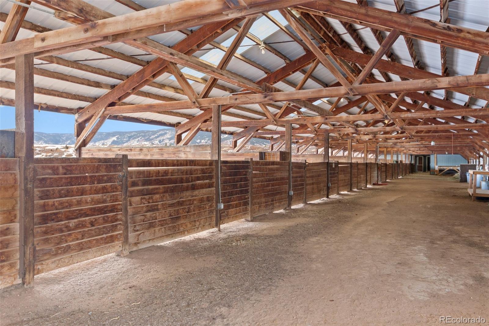 2073 South Perry Park Road Sedalia, CO 80135 - Photo 31 of 40 a view of storage and utility room