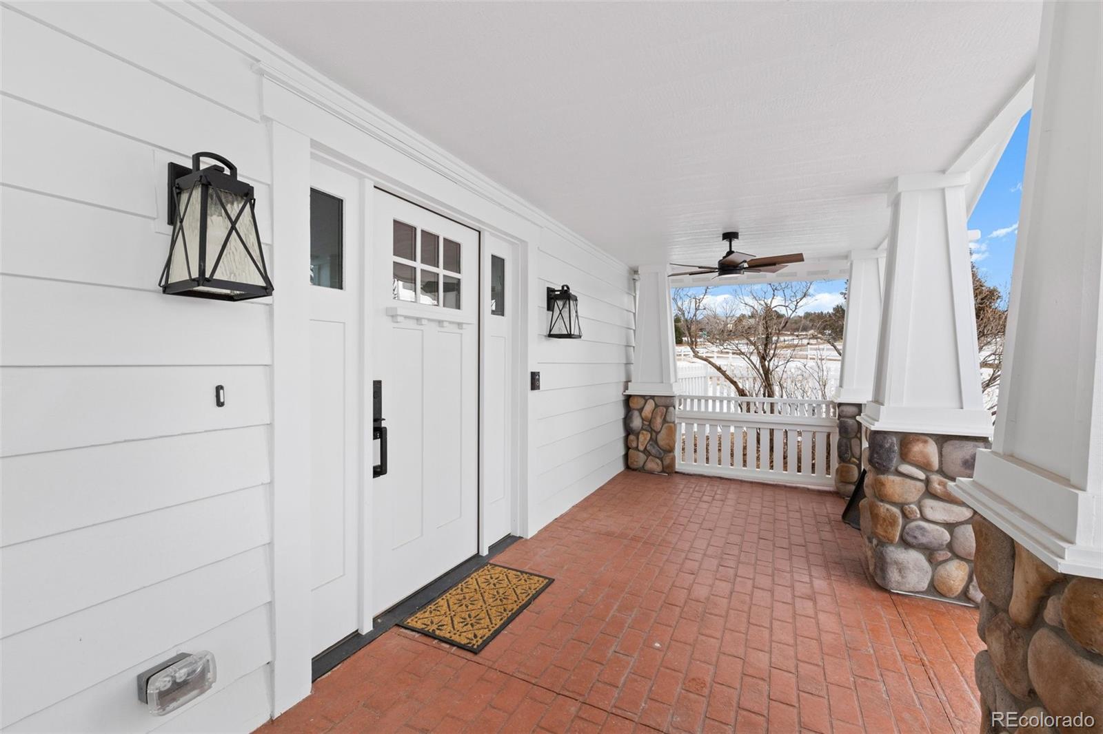2073 South Perry Park Road Sedalia, CO 80135 - Photo 5 of 40 a view of a room with window and hardwood floor