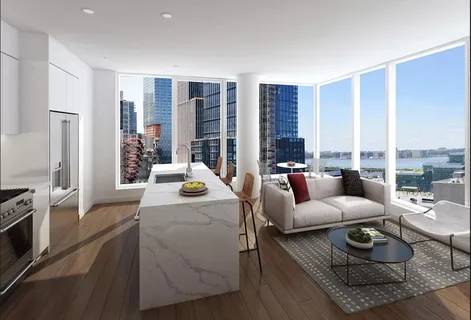 a living room with furniture and large windows